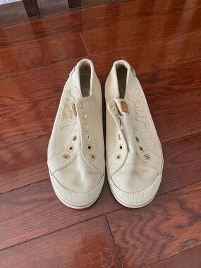 Coach Beige Slip-On Canvas Sneakers with Gold Eyelets